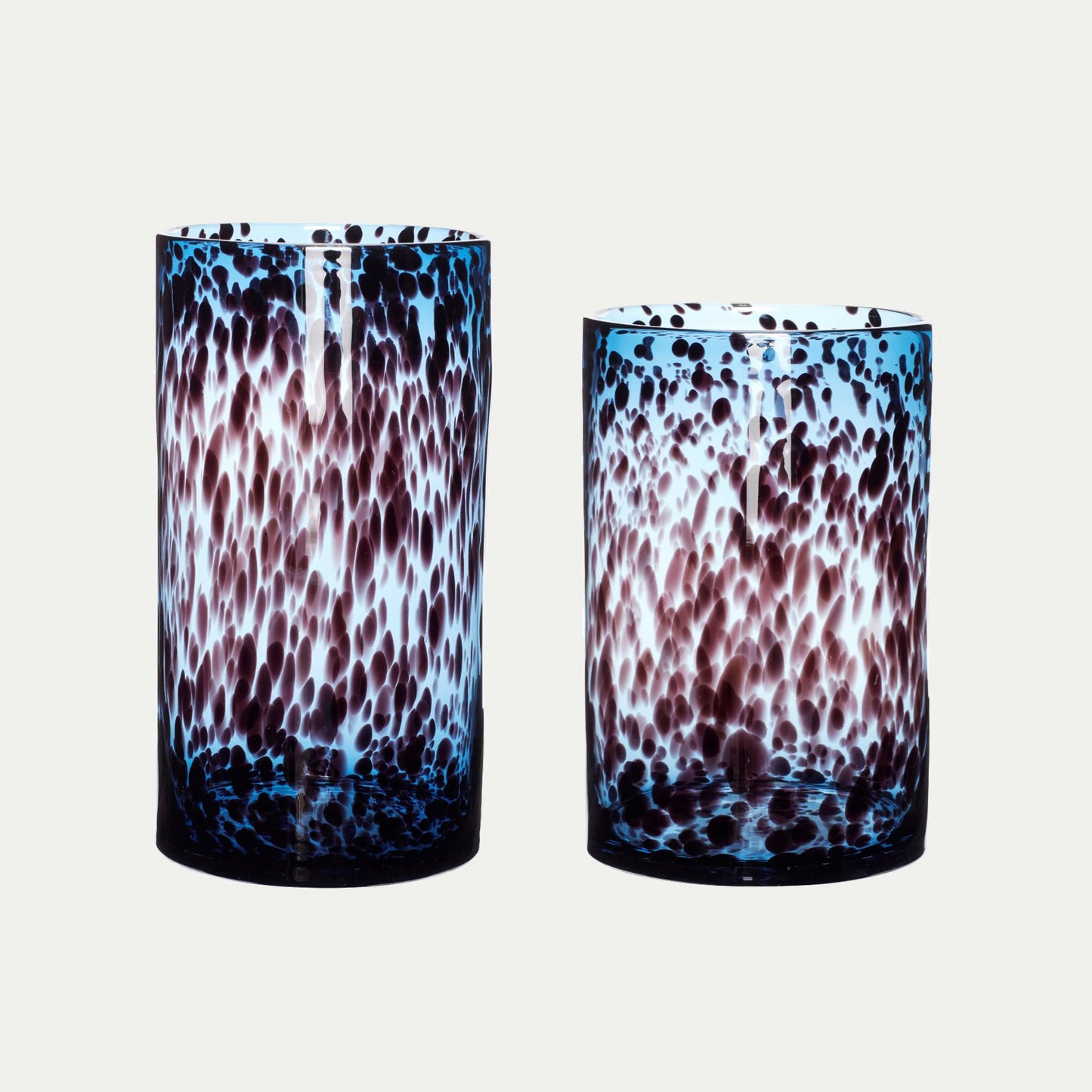 Hubsch Interior Nordic designer cylinder vases in blue glass with burgundy dot texture on white background