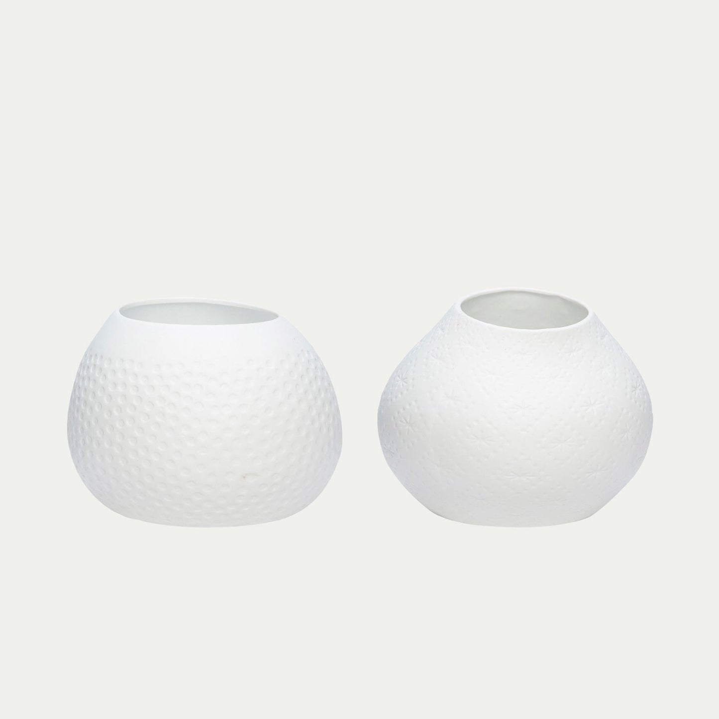 Hubsch Interior coral tea light holder set in white porcelain on white background