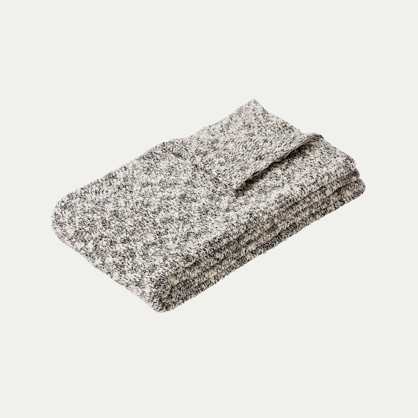 Hubsch Interior boucle cotton knitted throw blanket in grey, white and cream on white background