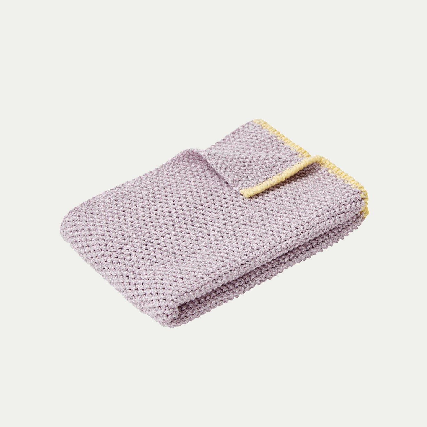 Hubsch Interior Scandi designer tea towel in lilac purple and yellow cotton knit on a white background