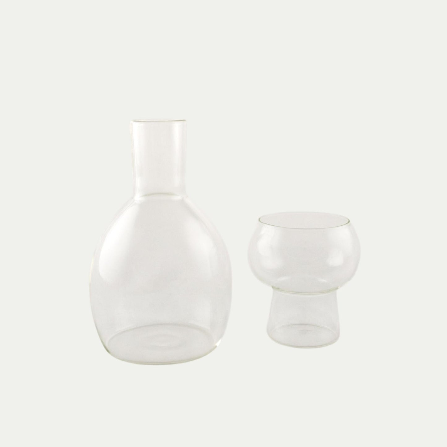 Coco and Henry clear Marnie carafe and stemless wine glass side by side, made from borosilicate glass